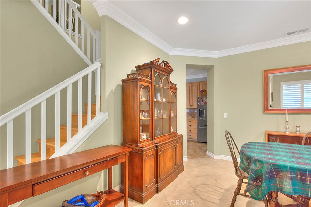 Undisclosed Address Upland, CA 91784 - Photo 8 of 38 a view of a hallway with furniture and windows