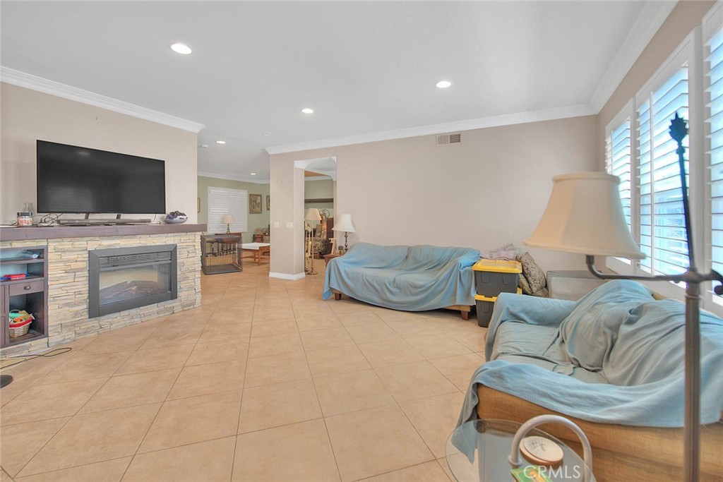 Undisclosed Address Upland, CA 91784 - Photo 10 of 38 a living room with furniture and a flat screen tv