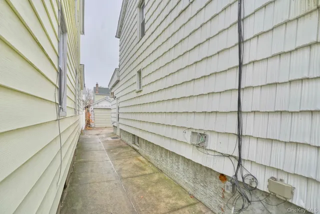 a view of entryway with wooden door
