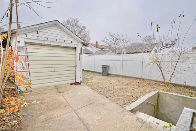 a view of a backyard of the house