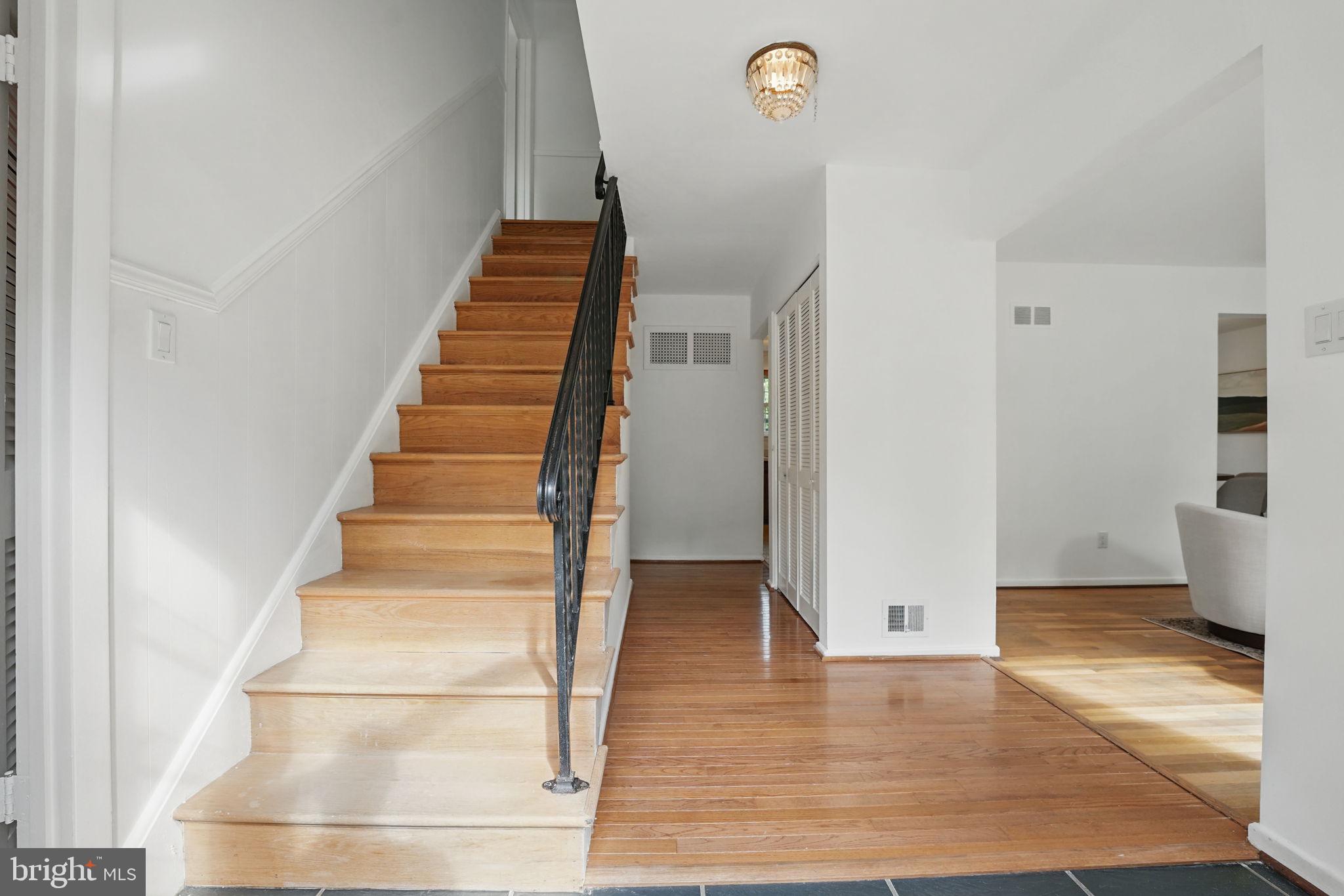 2524 Swift Run Street Vienna, VA 22180 - Photo 14 of 55 a view of entryway and hall with wooden floor