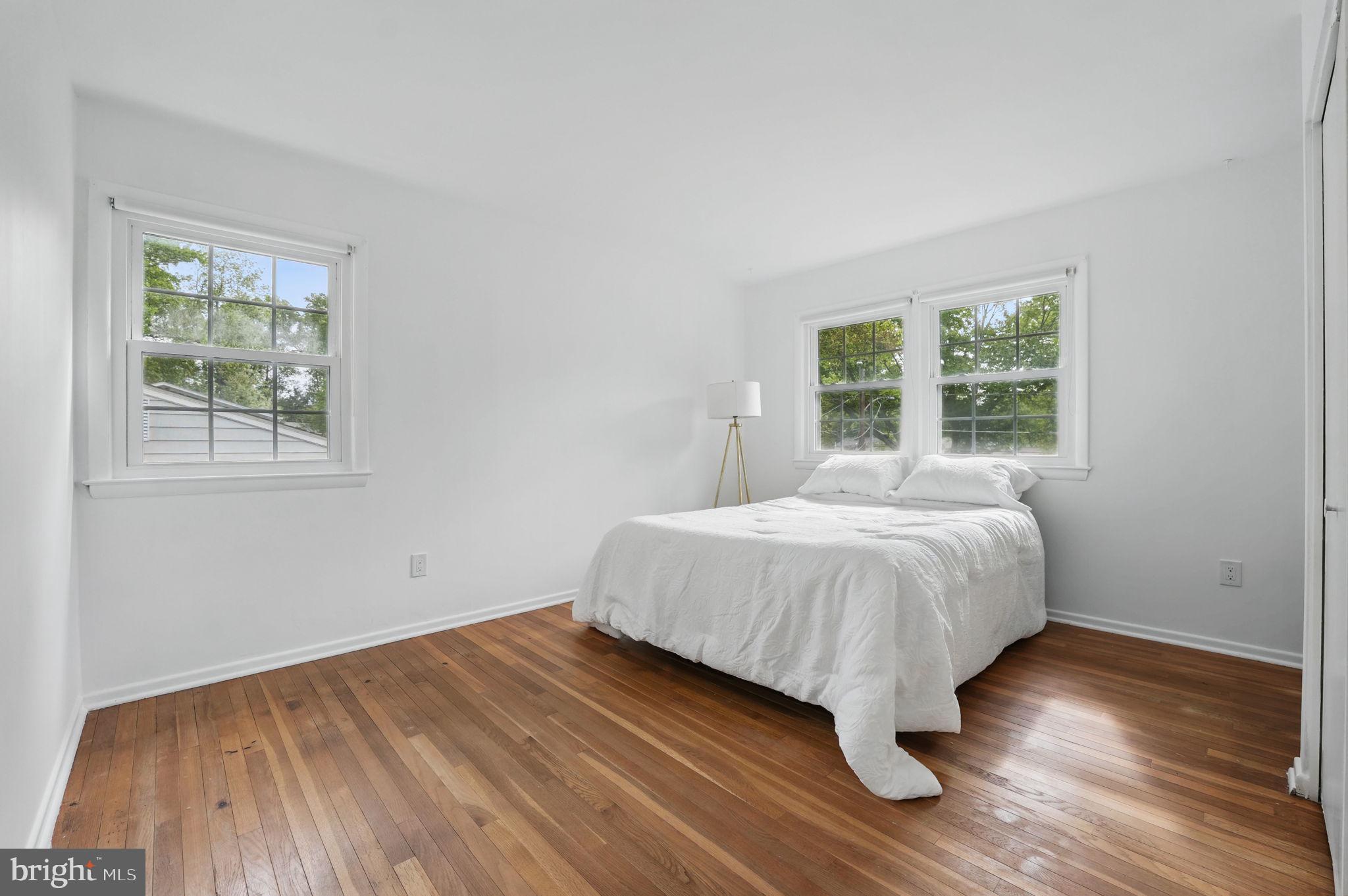 2524 Swift Run Street Vienna, VA 22180 - Photo 16 of 55 a bedroom with a bed and a window