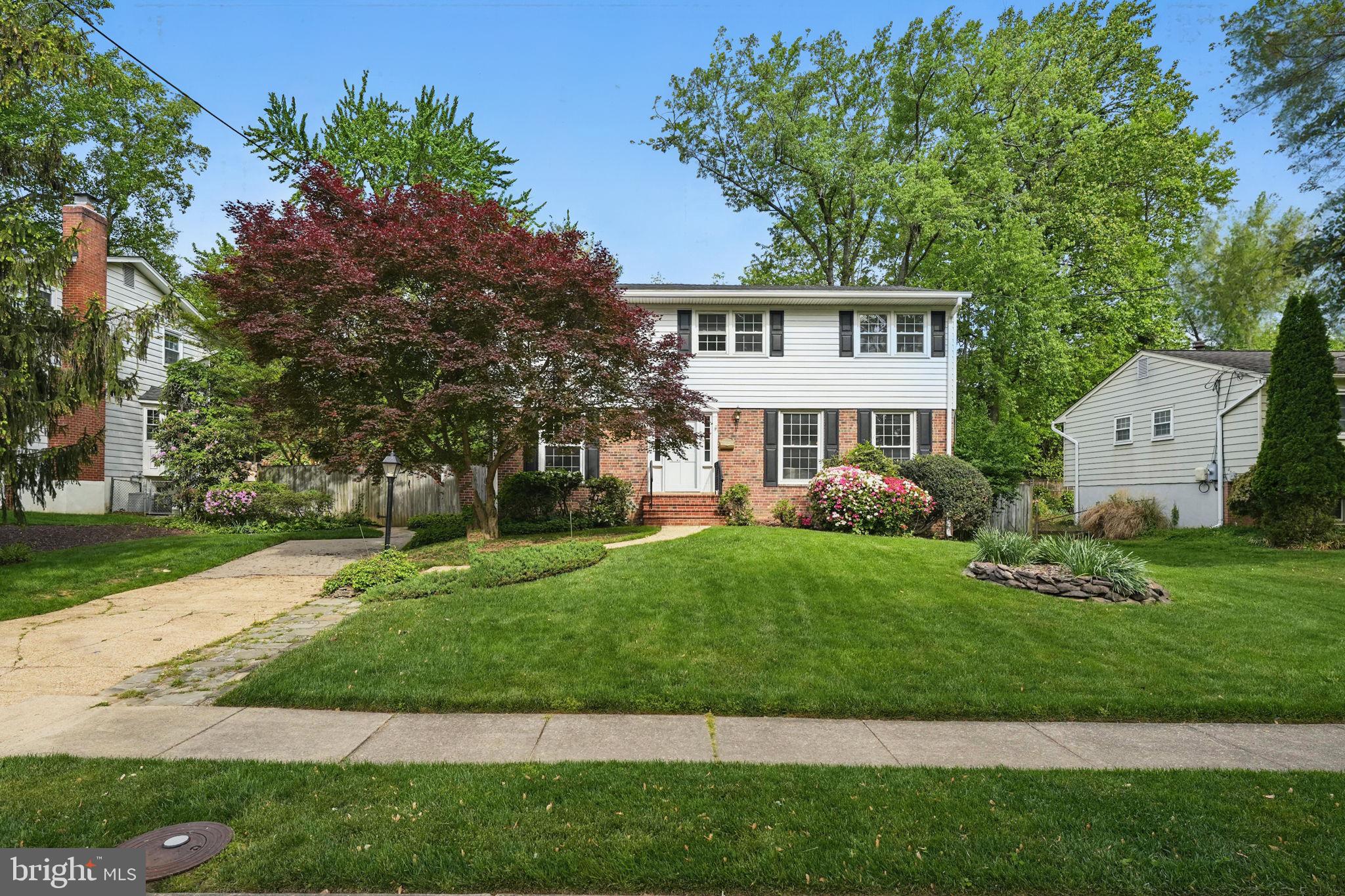 2524 Swift Run Street Vienna, VA 22180 - Photo 2 of 55 a front view of a house with a yard
