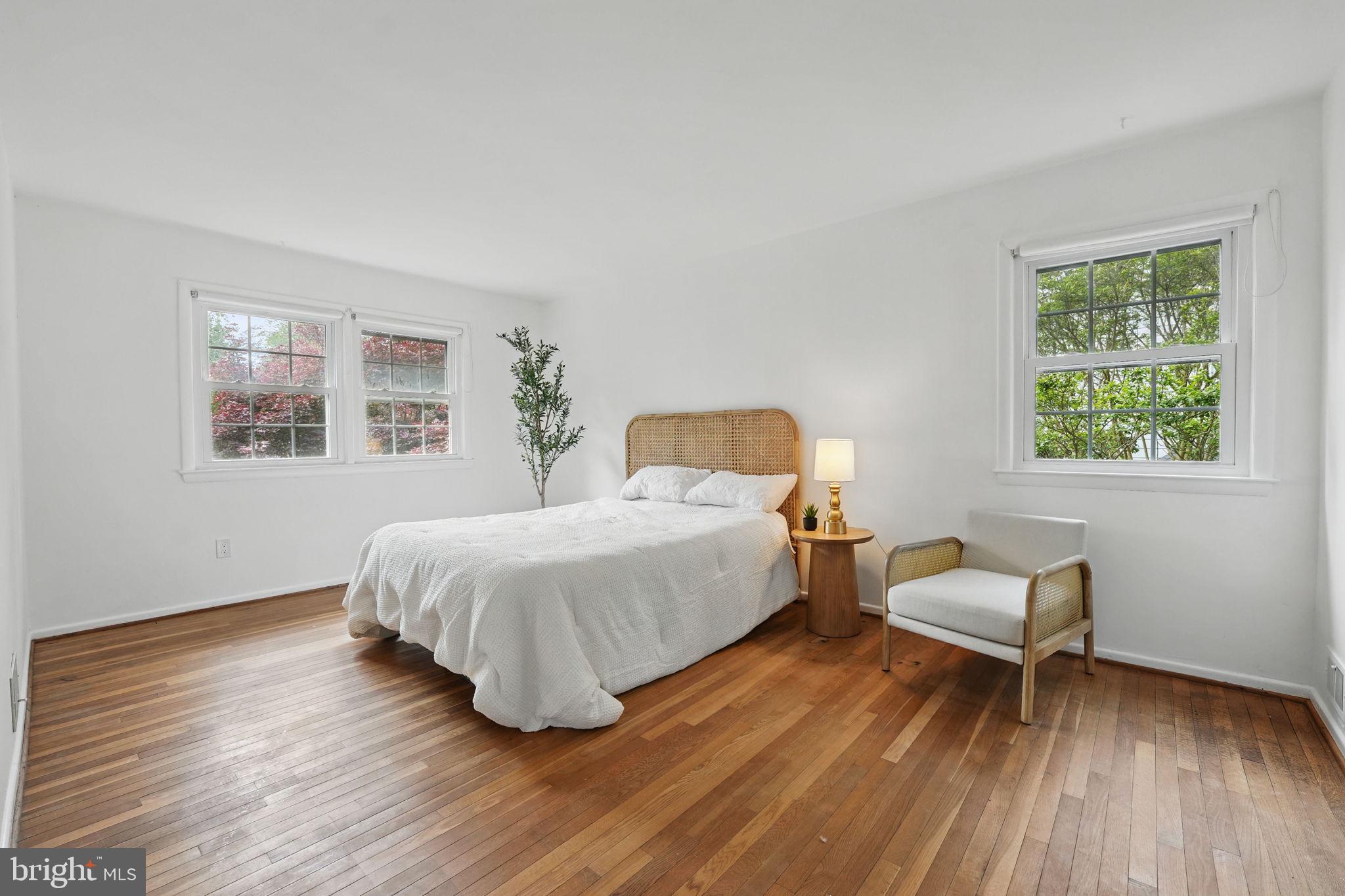 2524 Swift Run Street Vienna, VA 22180 - Photo 22 of 55 a bedroom with a bed and a window