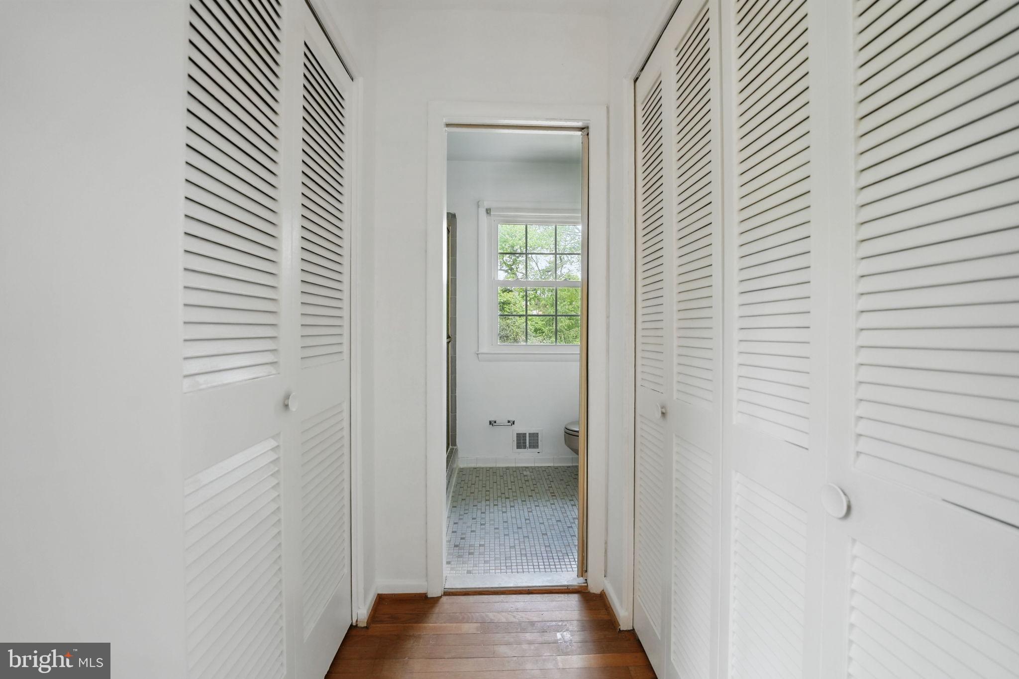 2524 Swift Run Street Vienna, VA 22180 - Photo 24 of 55 a view of a hallway with closet and a window