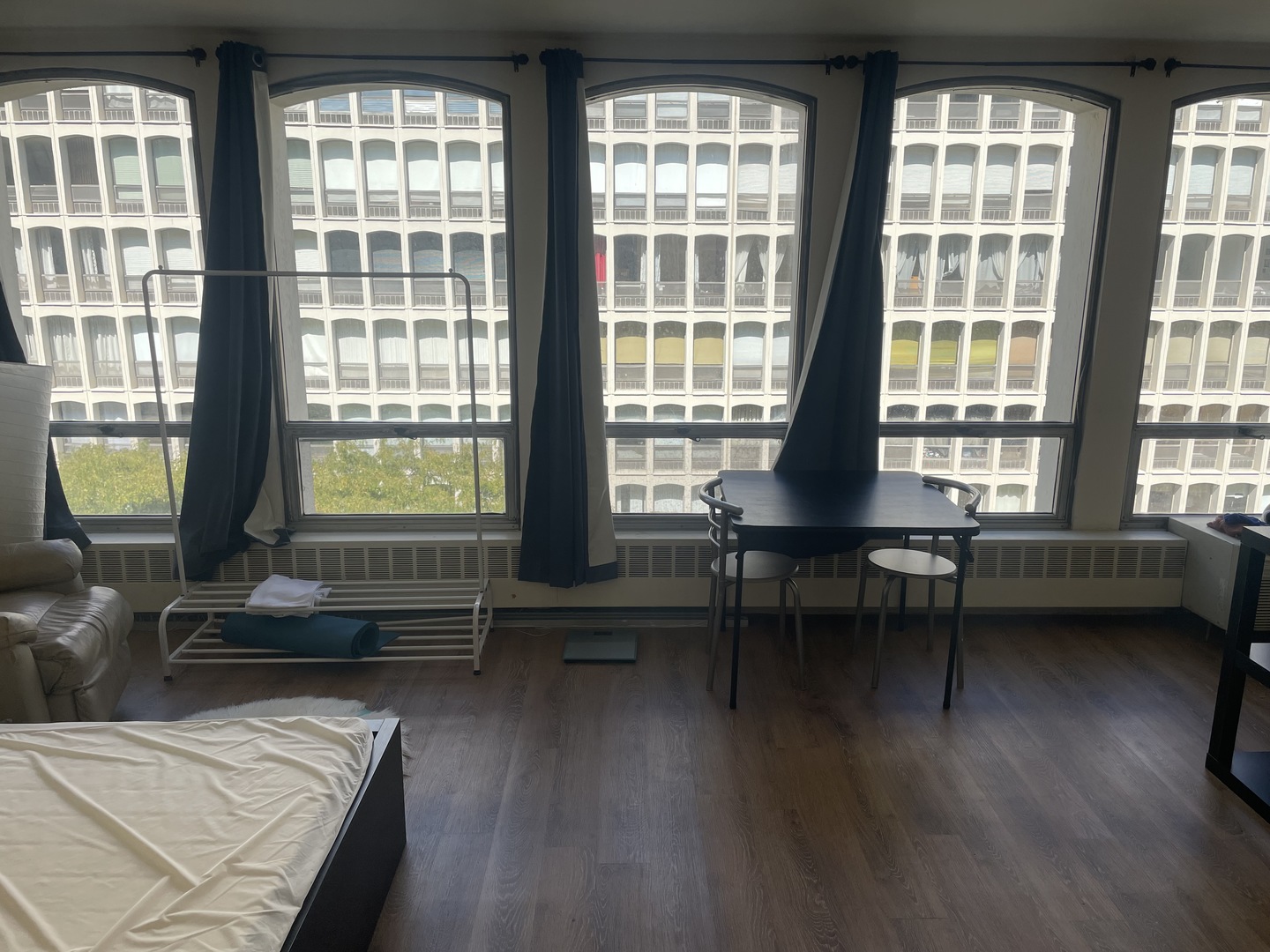 1400 East 55th Place, Unit 613S Chicago, IL 60637 - Photo 6 of 12 a living room with furniture and a window