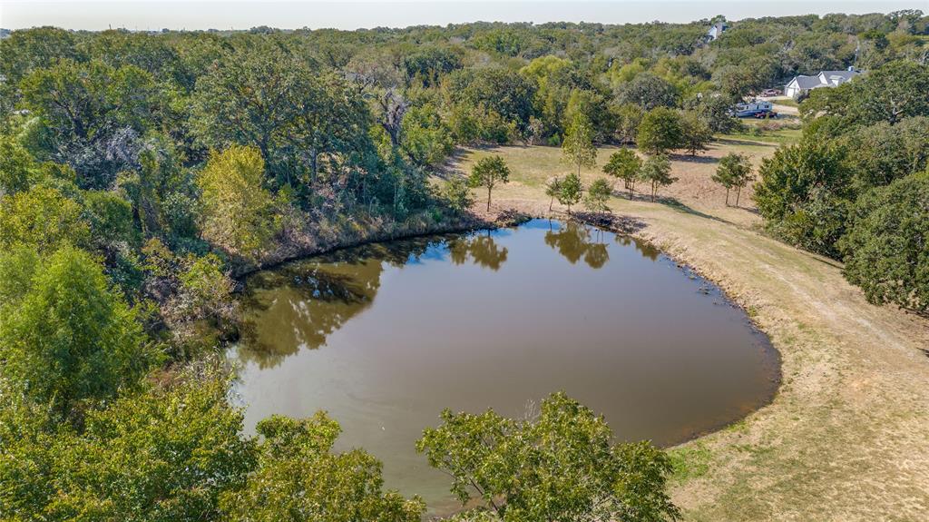 Tbd Mountain View Road Aubrey, TX 76227 - Photo 12 of 16 a view of a lake from a yard