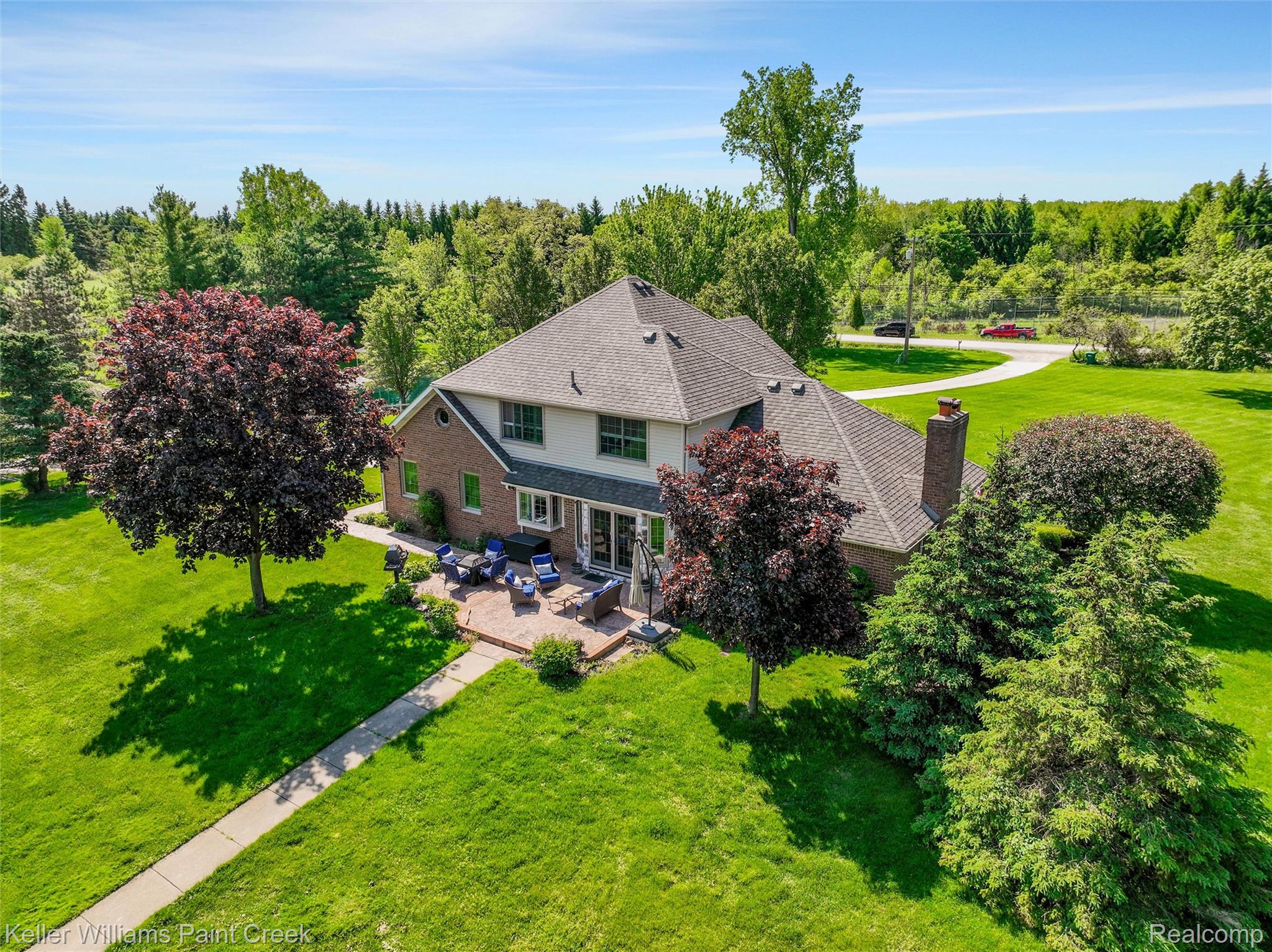 5813 36 Mile Road Romeo, MI 48065 - Photo 62 of 81 Brick and siding residence with a large rear patio