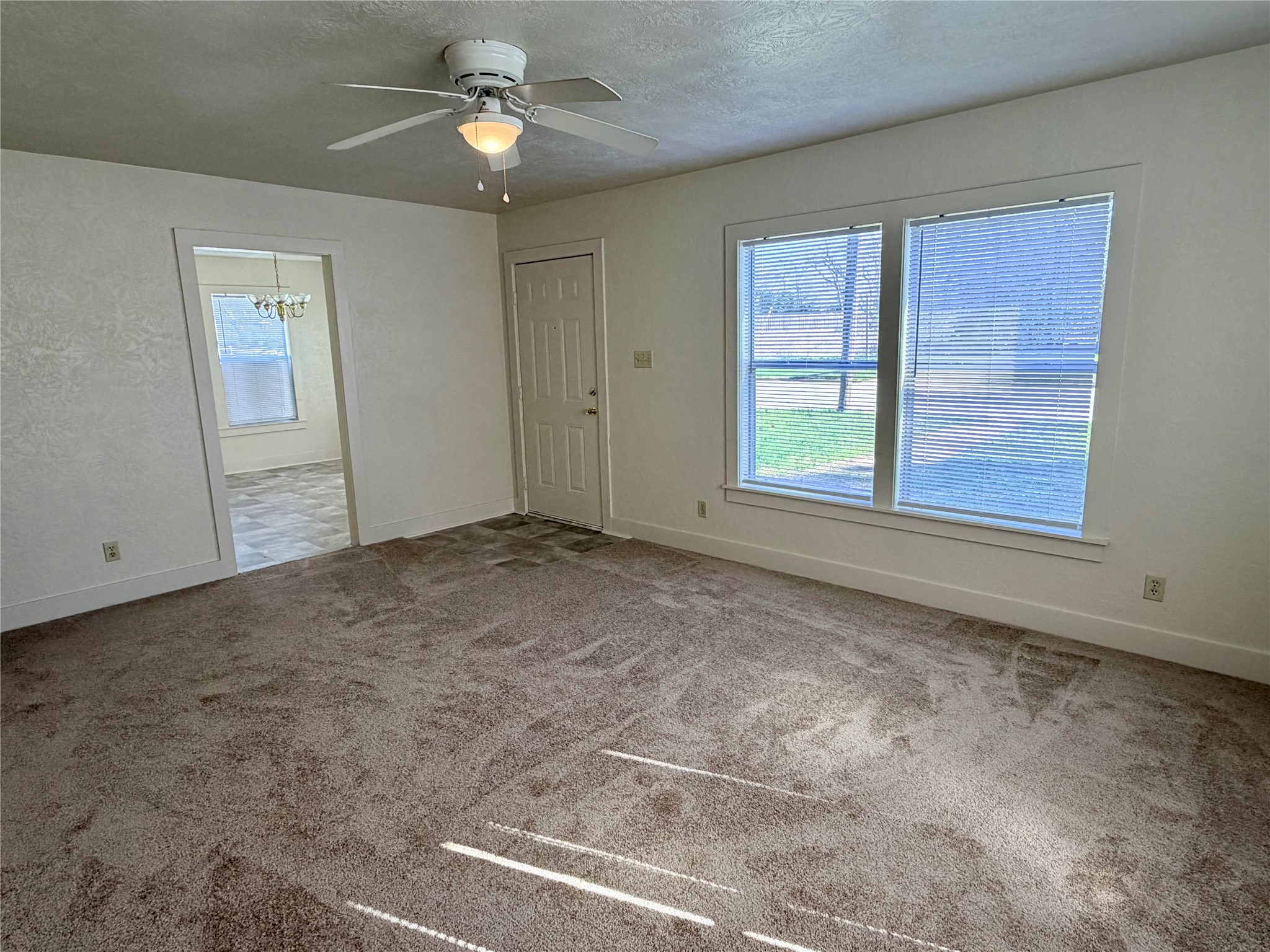 500 West Third Street Brenham, TX 77833 - Photo 6 of 16 a view of an empty room with a window