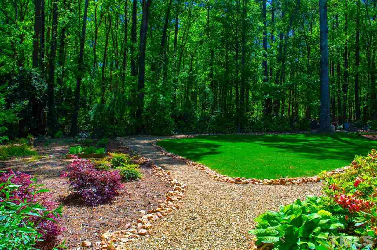 10016 Bushveld Lane Raleigh, NC 27613 - Photo 6 of 24 a view of a garden with plants