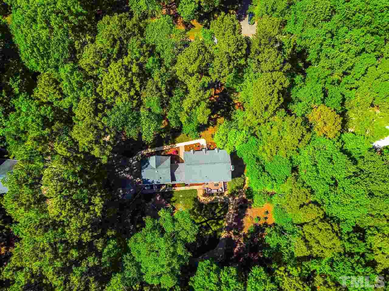 10016 Bushveld Lane Raleigh, NC 27613 - Photo 7 of 24 an aerial view of a house with a yard