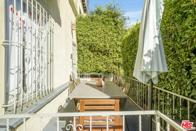 a view of parking area and car parked