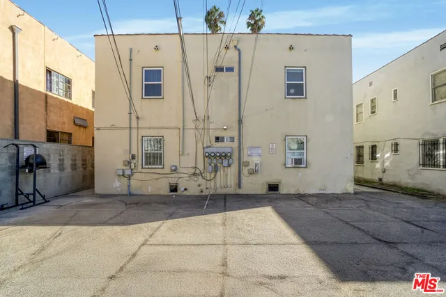 a view of a street with cars