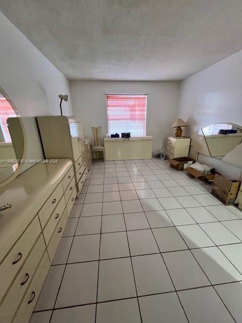 5201 Northwest 7th Street, Unit 507 Miami, FL 33126 - Photo 11 of 18 a living room with furniture and a projector screen
