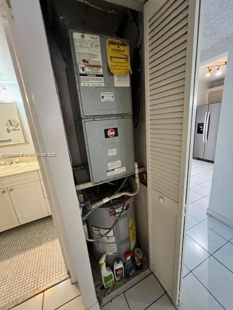 5201 Northwest 7th Street, Unit 507 Miami, FL 33126 - Photo 13 of 18 a bathroom with a sink and a mirror