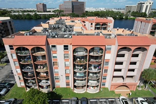 5201 Northwest 7th Street, Unit 507 Miami, FL 33126 - Photo 5 of 18 an aerial view of a house with garden space and lake view