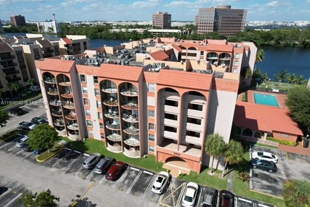5201 Northwest 7th Street, Unit 507 Miami, FL 33126 - Photo 6 of 18 an aerial view of a house with outdoor space