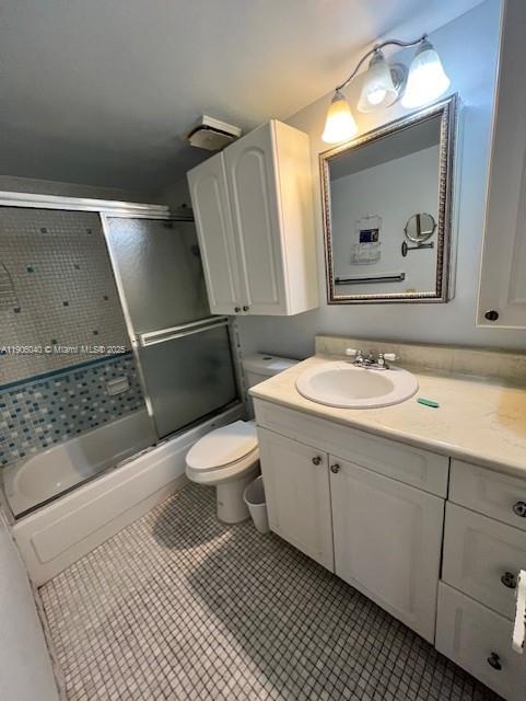 5201 Northwest 7th Street, Unit 507 Miami, FL 33126 - Photo 10 of 18 a bathroom with a sink a toilet and mirror