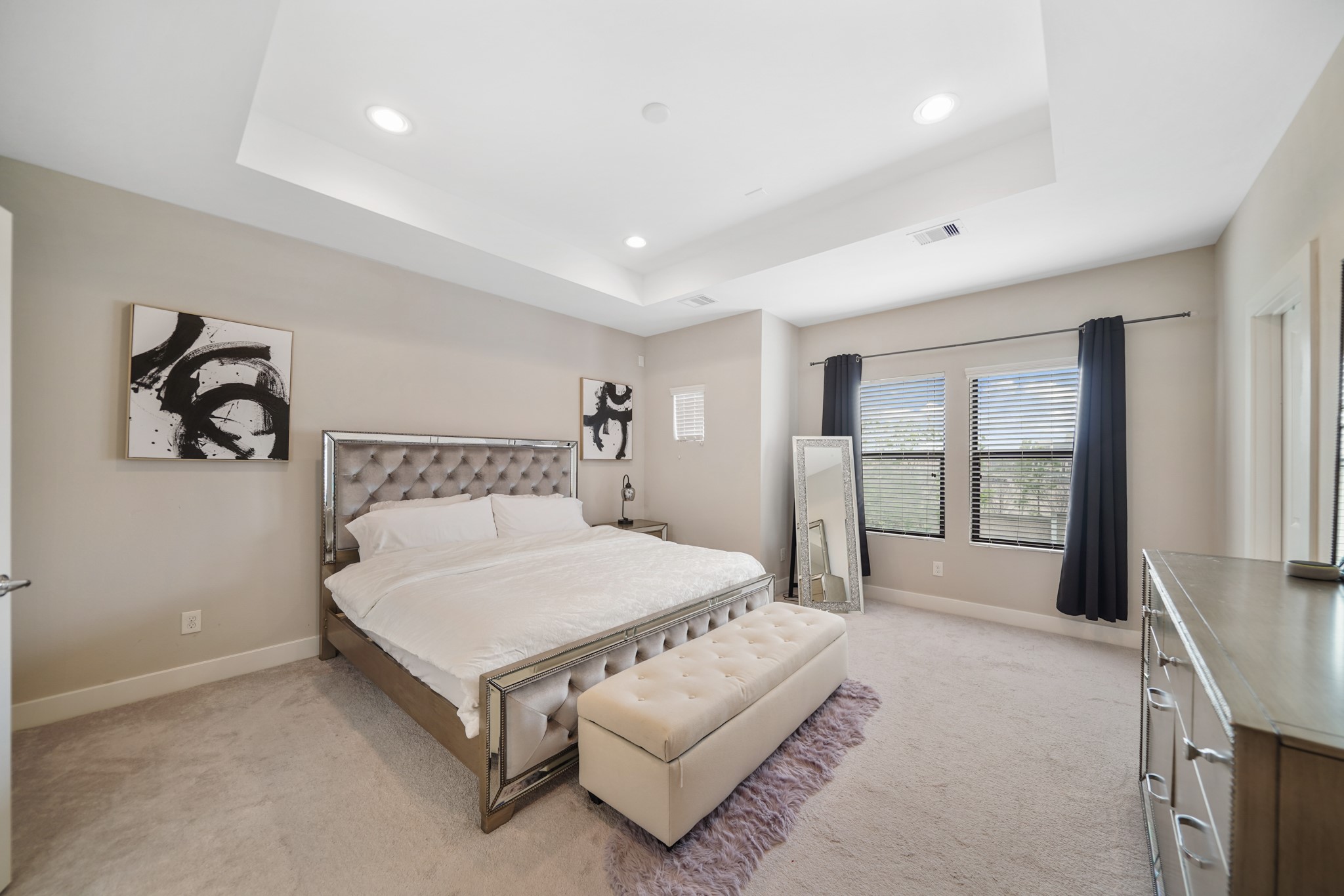 1824 Bonner Street Houston, TX 77007 - Photo 23 of 39 a spacious bedroom with a bed and large window
