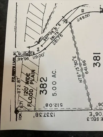 a view of a lake with a mountain