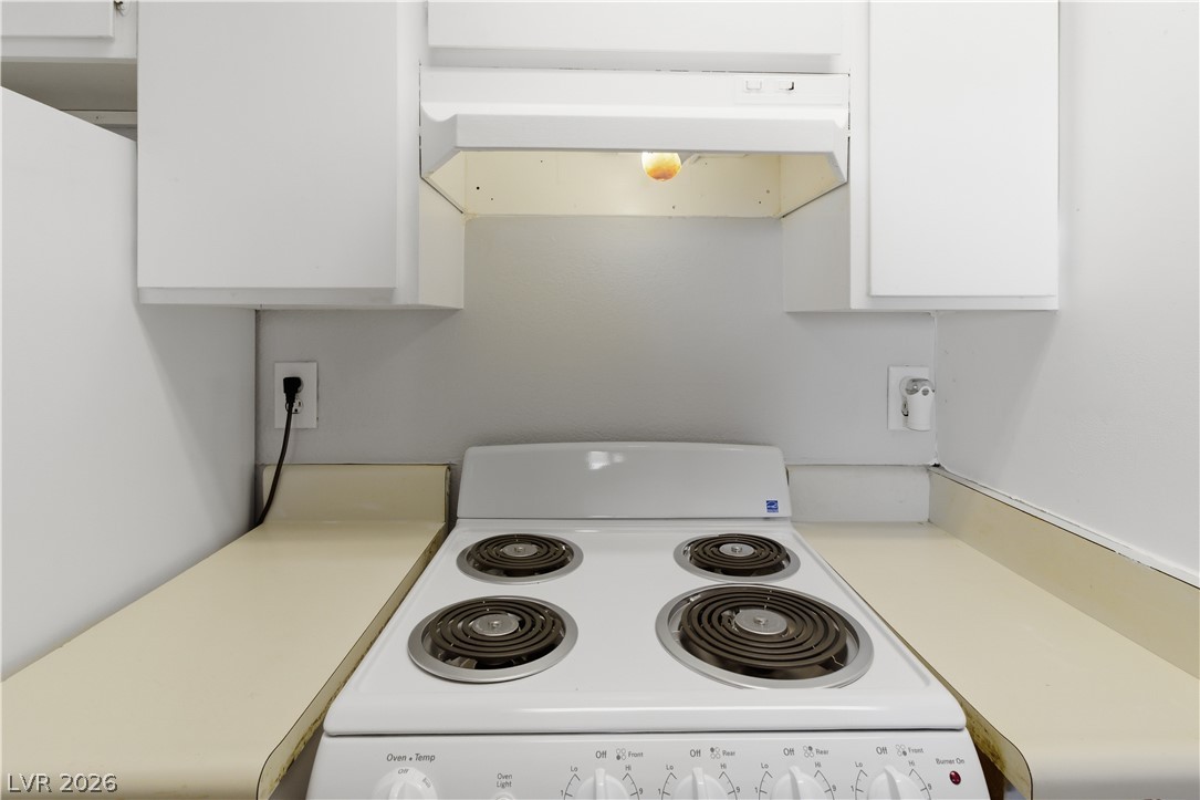 2221 West Bonanza Road, Unit 28 Las Vegas, NV 89106 - Photo 12 of 15 This bright kitchen features a functional electric range with ample counter space.