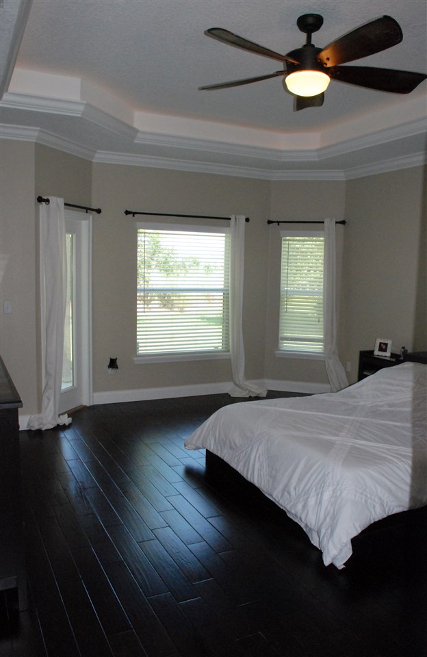 652 Porta Rosa Circle St. Augustine, FL 32092 - Photo 23 of 48 Large master bedroom with beautiful flooring
