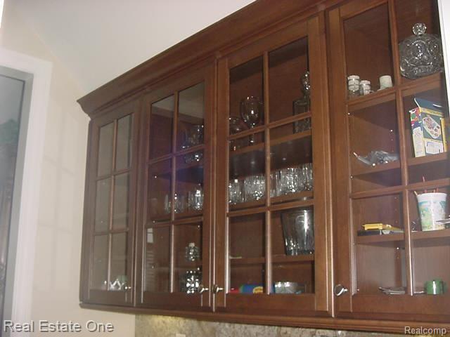 645 Langley Road Rochester, MI 48309 - Photo 22 of 24 Upper Glass Cabinets