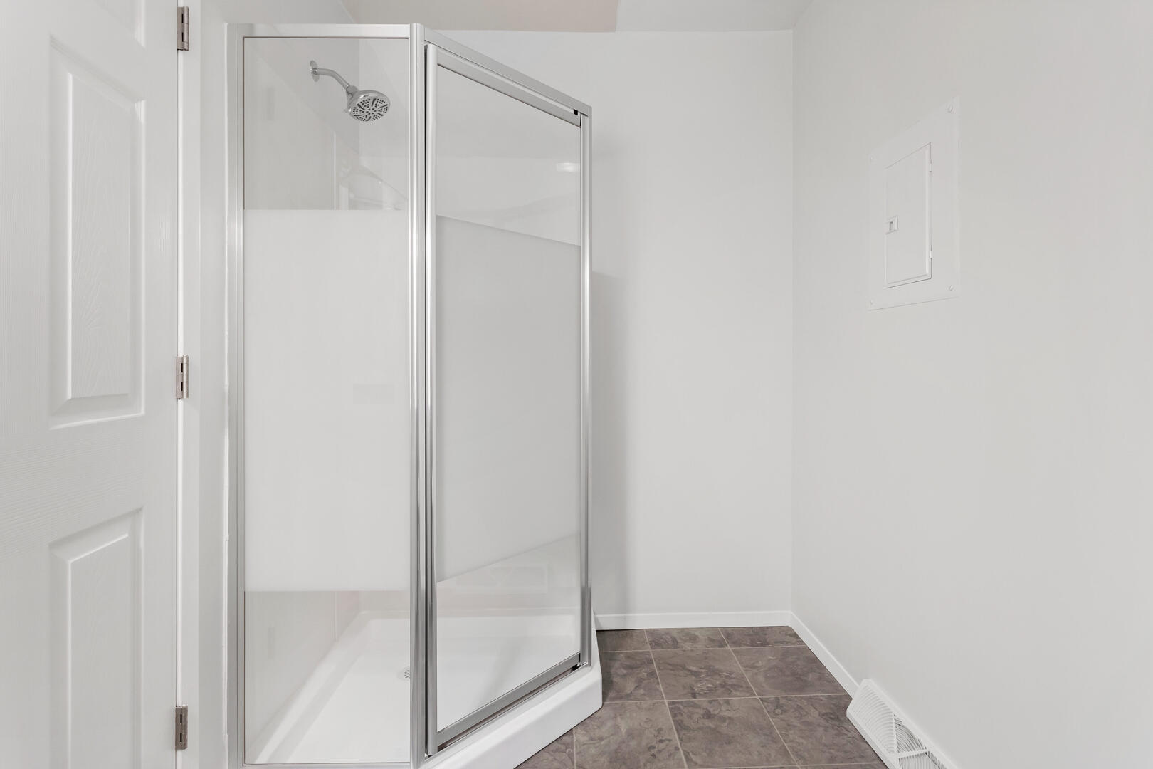 208 Maple Street Ogden, IL 61859 - Photo 14 of 30 a bathroom with a glass shower door