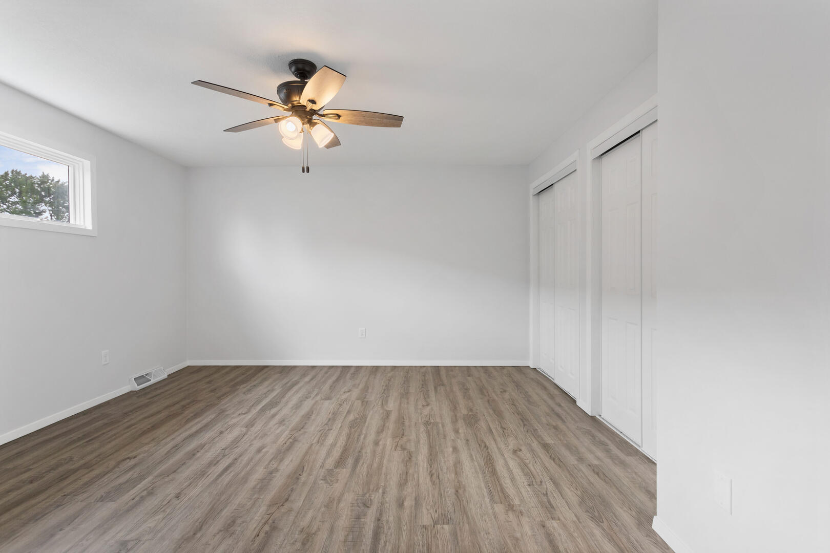 208 Maple Street Ogden, IL 61859 - Photo 18 of 30 a view of empty room with wooden floor