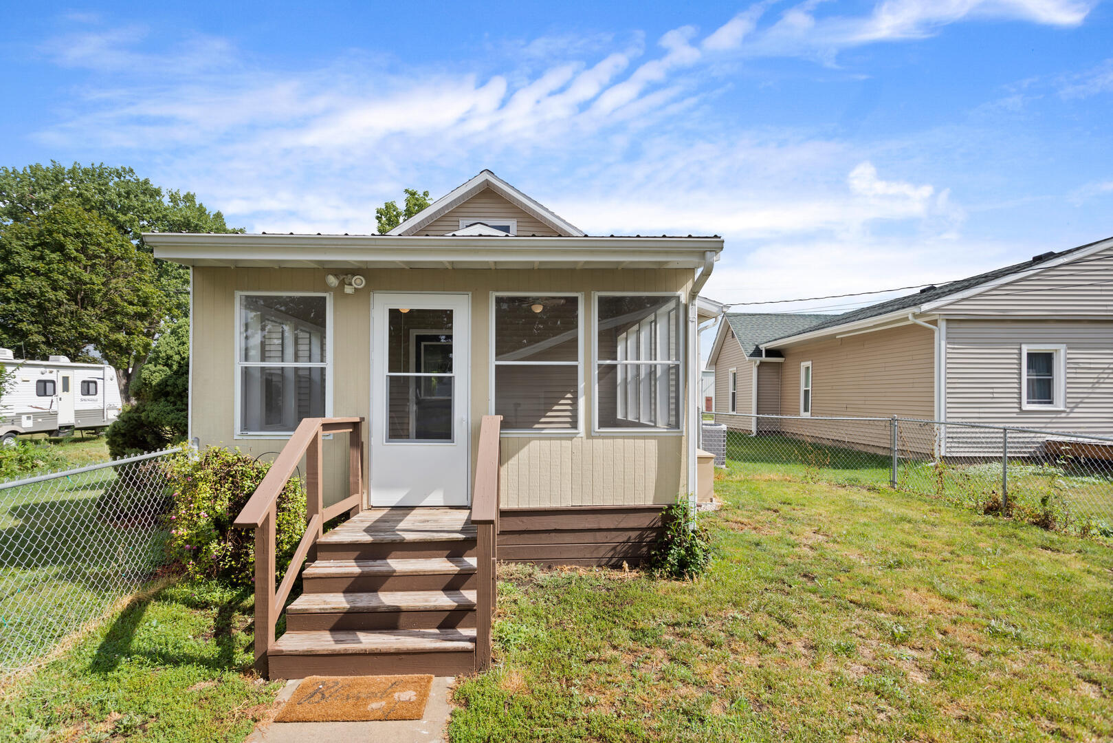 208 Maple Street Ogden, IL 61859 - Photo 25 of 30 a front view of a house with garden