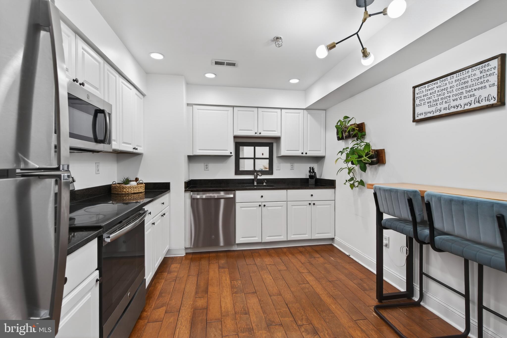 104 Woodside Road, Unit A102 Haverford, PA 19041 - Photo 13 of 46 Newer White Eat-in Kitchen