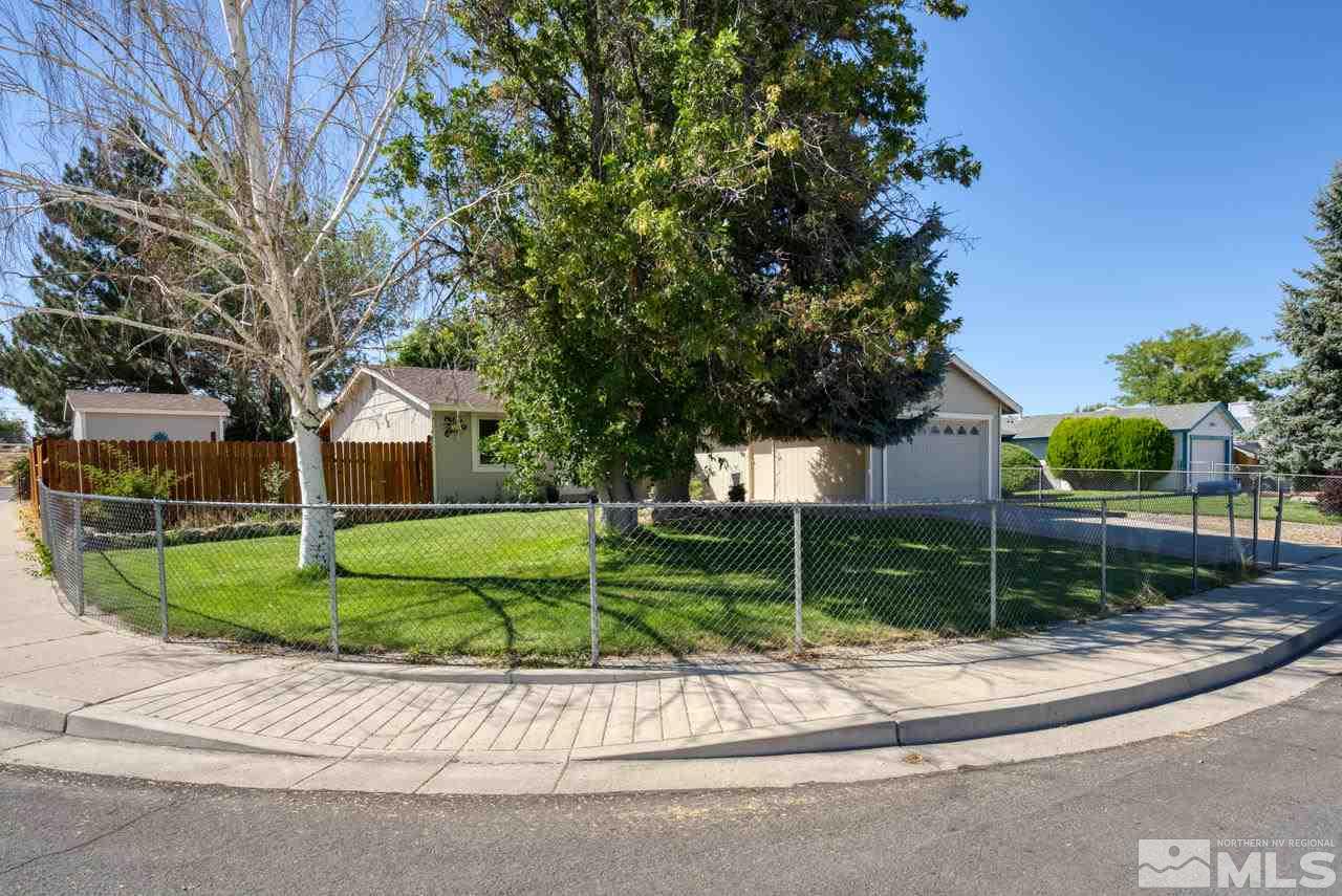 12085 Kernite Street Reno, NV 89506 - Photo 1 of 29 a house view with a garden space