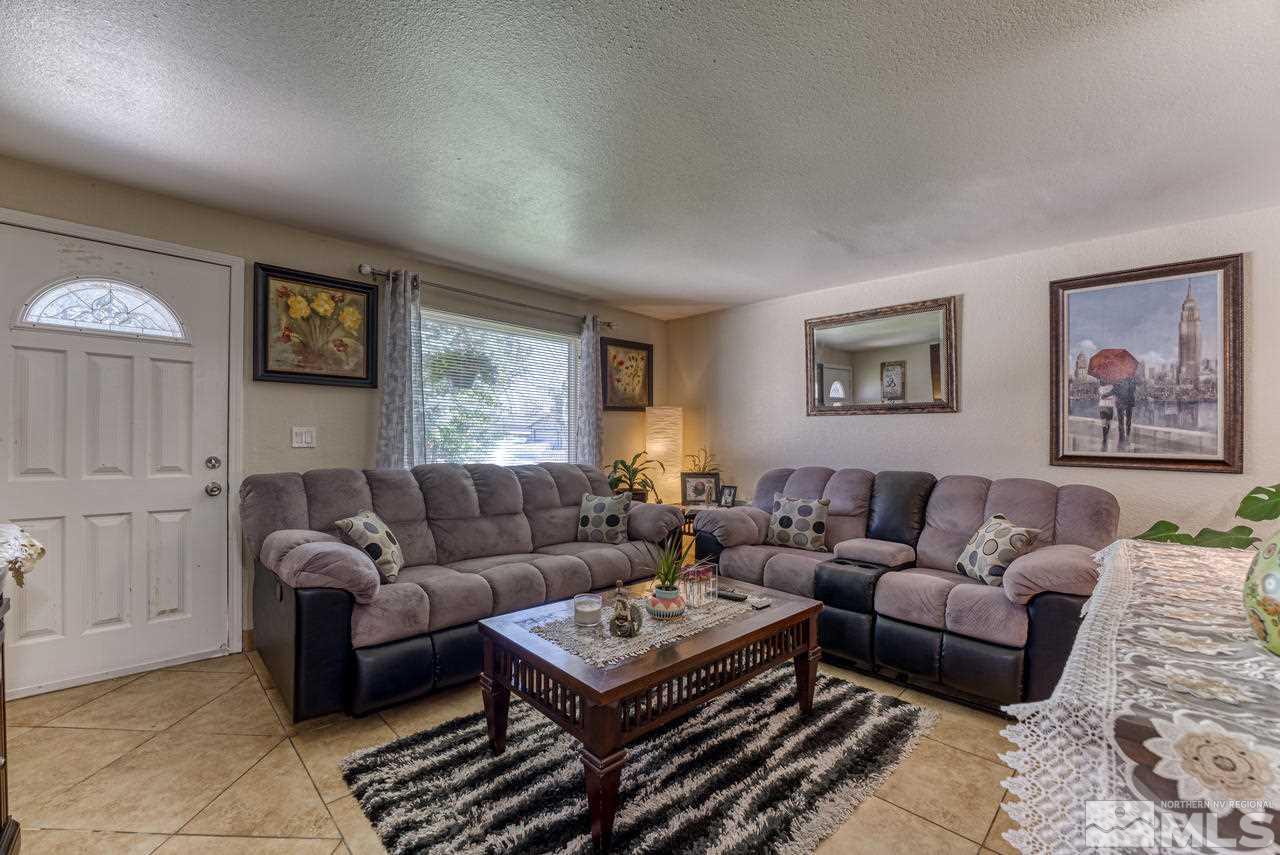12085 Kernite Street Reno, NV 89506 - Photo 5 of 29 a living room with furniture and a window