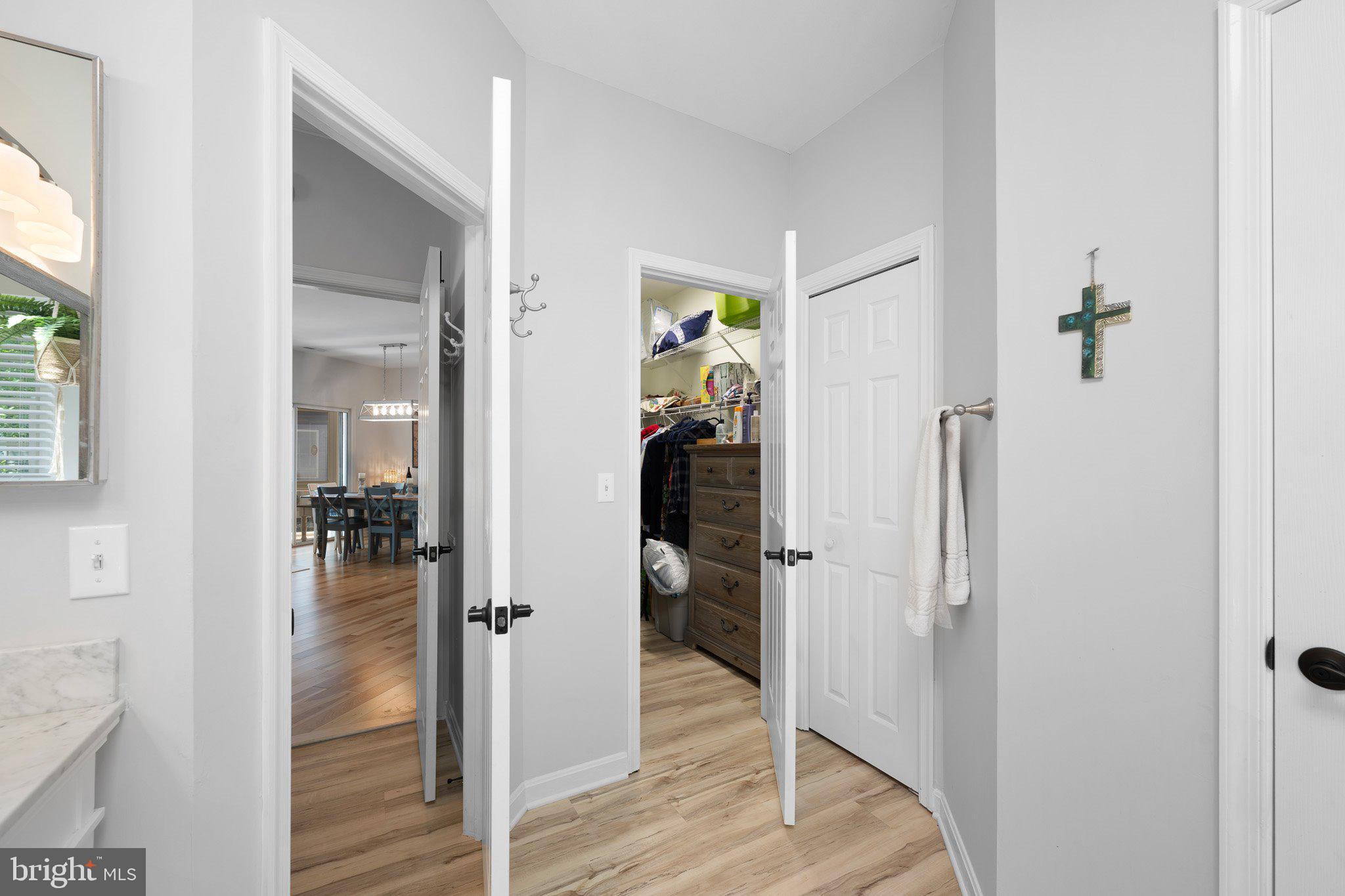 718 Foxtail Drive Bethany Beach, DE 19930 - Photo 20 of 39 a view of a hallway with closet and wooden floor