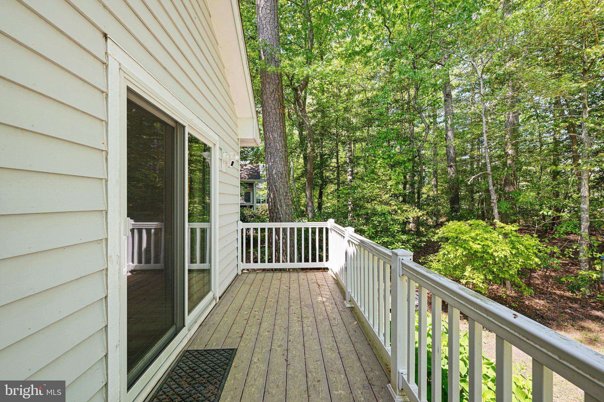 718 Foxtail Drive Bethany Beach, DE 19930 - Photo 29 of 39 a view of a balcony with wooden floor
