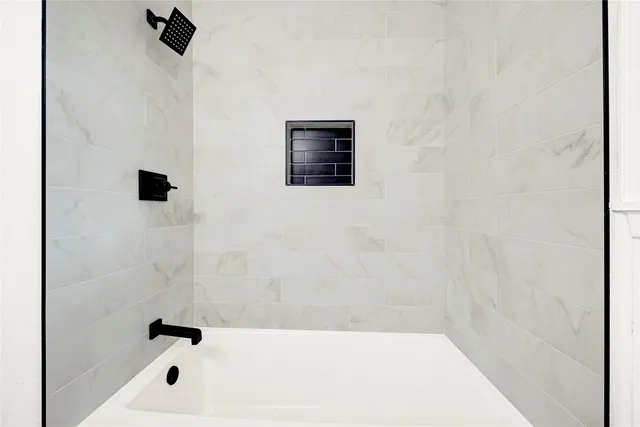 a bathroom with a bathtub