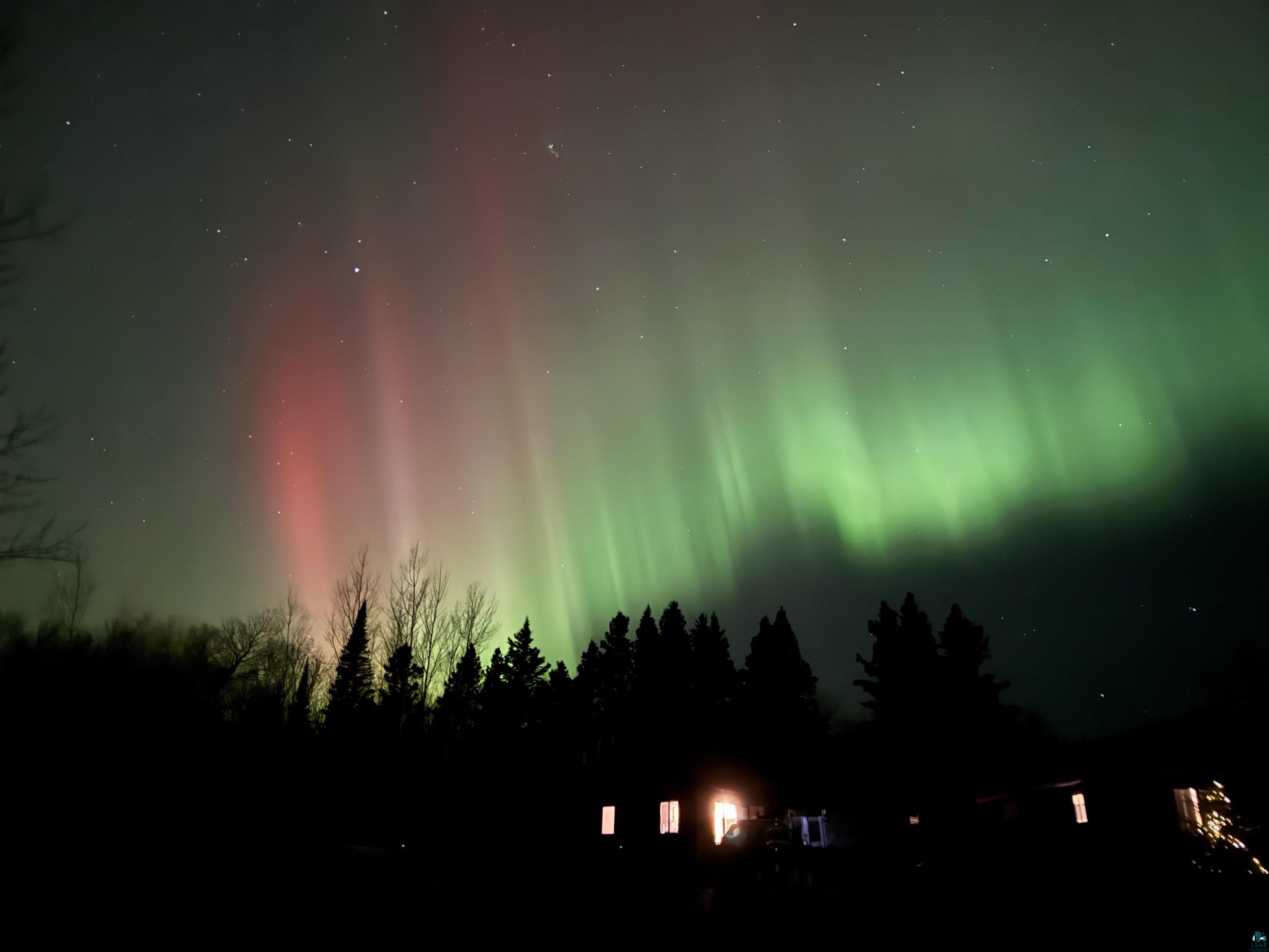 265 Mink Ranch Road Lutsen, MN 55612 - Photo 2 of 25 Northern Lights above the property