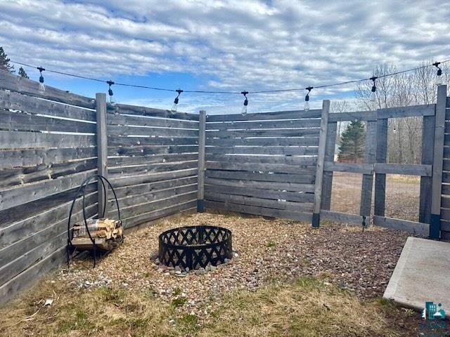 265 Mink Ranch Road Lutsen, MN 55612 - Photo 10 of 36 Private outdoor space featuring a wood fence enclosure with a slatted design
