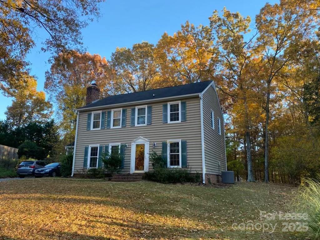 7327 Ricewell Road Charlotte, NC 28226 - Photo 1 of 22 a front view of a house with a garden