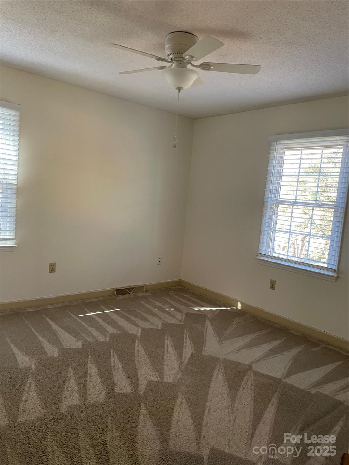7327 Ricewell Road Charlotte, NC 28226 - Photo 15 of 22 a view of an empty room and a windows