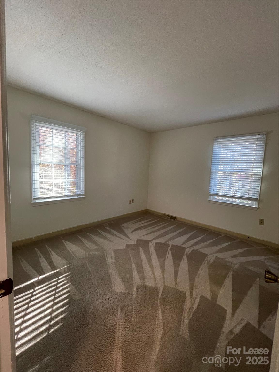 7327 Ricewell Road Charlotte, NC 28226 - Photo 17 of 22 a view of a livingroom with a window