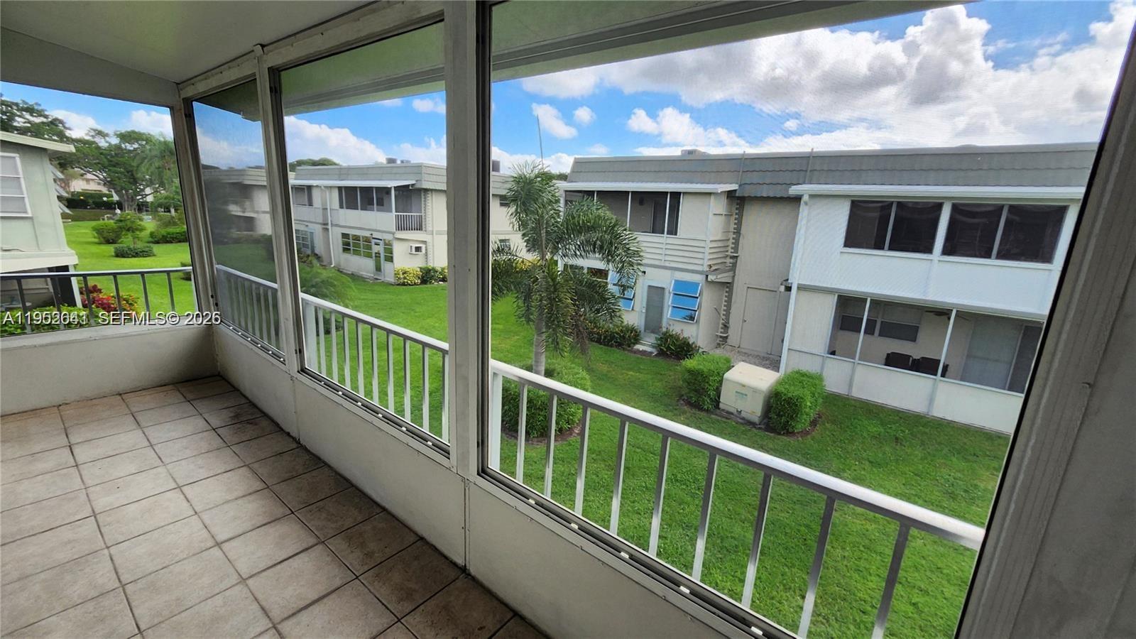 756 Flanders P Delray Beach, Unit 756 Delray Beach, FL 33484 - Photo 15 of 46 a view of balcony with yard