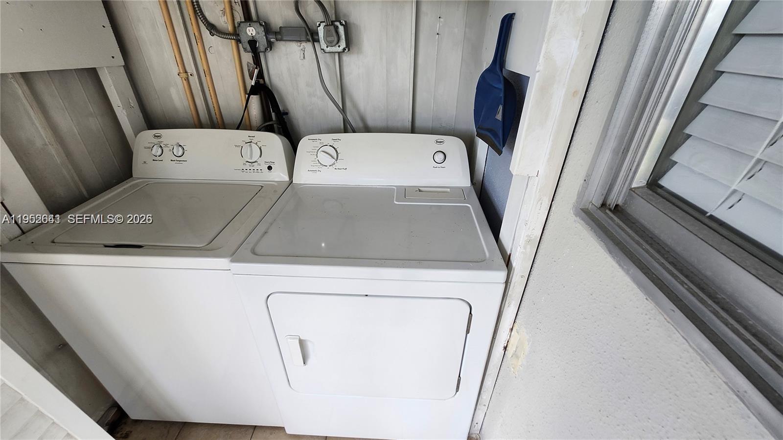 756 Flanders P Delray Beach, Unit 756 Delray Beach, FL 33484 - Photo 24 of 46 a utility room with dryer and washer