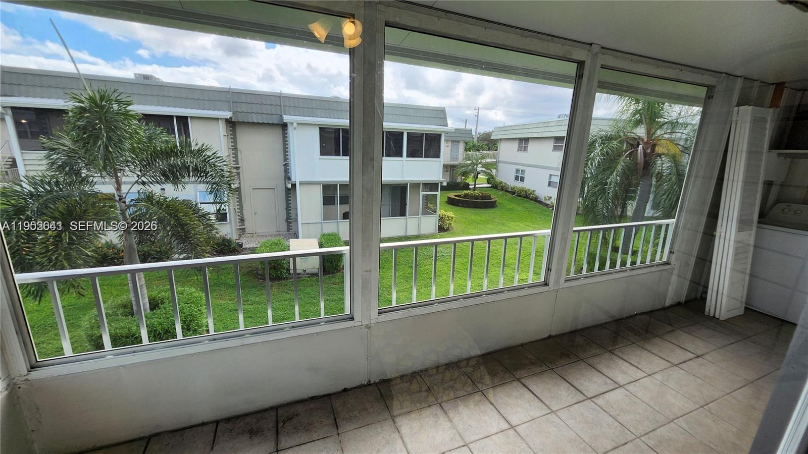 756 Flanders P Delray Beach, Unit 756 Delray Beach, FL 33484 - Photo 10 of 46 a house view with a outdoor space