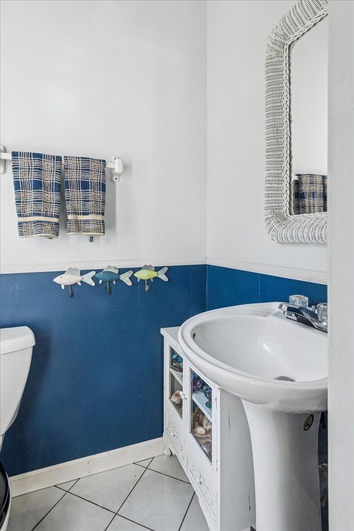 712 Regner Road McHenry, IL 60051 - Photo 15 of 25 a utility room with a sink dryer and washer
