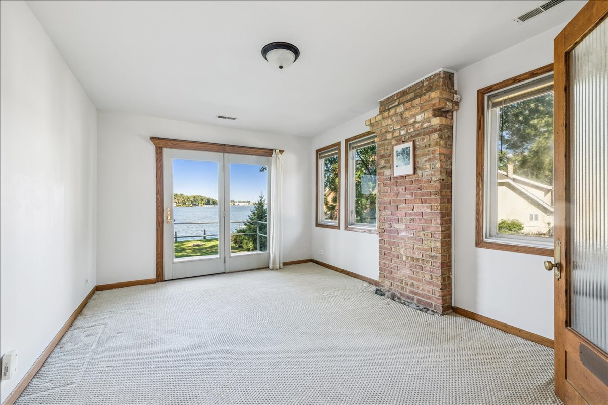 712 Regner Road McHenry, IL 60051 - Photo 18 of 25 a view of an empty room with a window