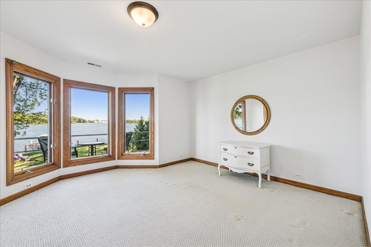 712 Regner Road McHenry, IL 60051 - Photo 22 of 25 an empty room with windows