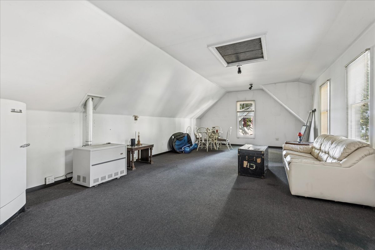 712 Regner Road McHenry, IL 60051 - Photo 23 of 25 a living room with furniture and white walls