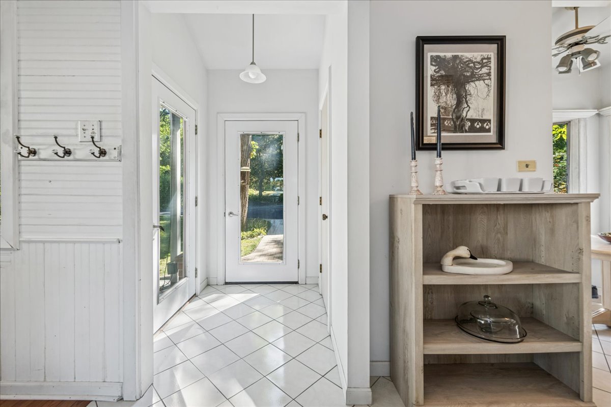 712 Regner Road McHenry, IL 60051 - Photo 9 of 25 a bathroom with a sink and a mirror