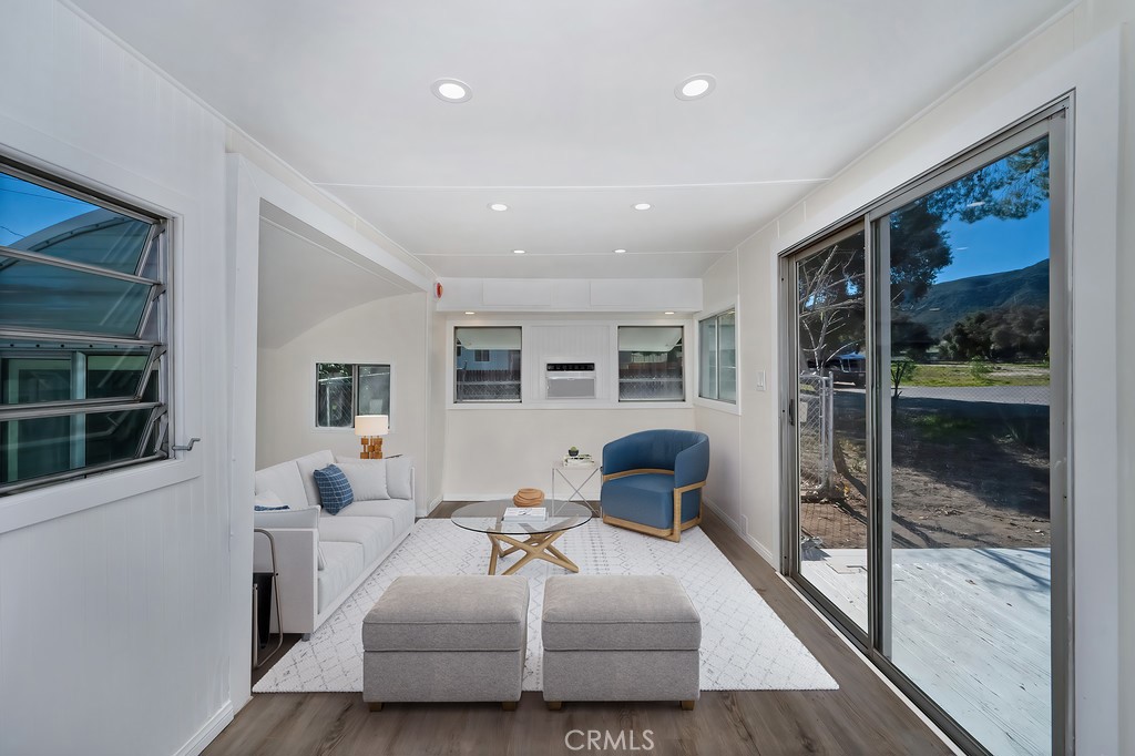 26455 Paradise Valley Road, Unit 87 Warner Springs, CA 92086 - Photo 11 of 20 Please note that the image shown is a virtually staged representation of the room and is intended to provide a visual concept of the space. The actual room may differ in appearance, and the furniture and decor depicted are not included in the sale. For an accurate understanding of the property's current condition and layout, we encourage you to view the home in person. Thank you